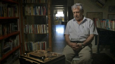 Israeli author Amos Oz listens to the Voices he recorded 45 ago.