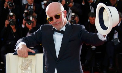Jacques Audiard showing off his Palme d'Or. And his hat. Photograph: Yves Herman/Reuters